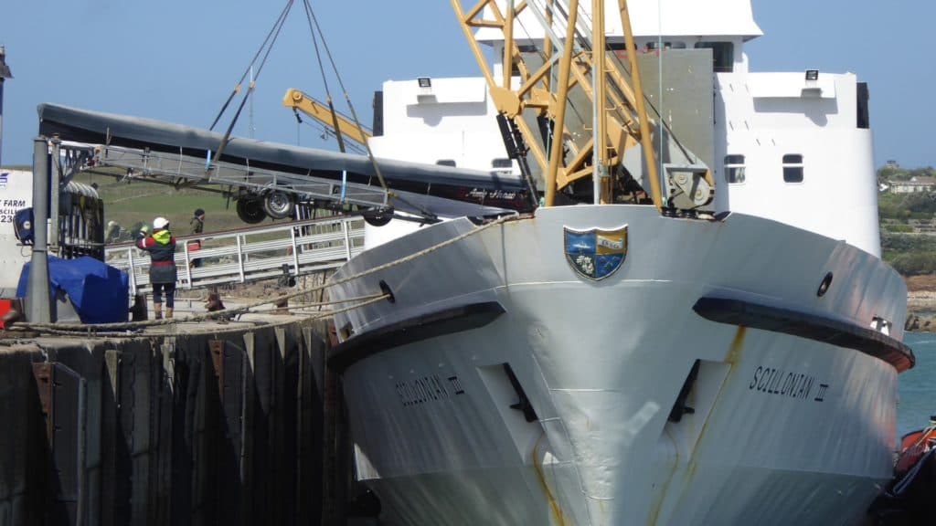 Scillonian III unloading pilot gigs on the Isles of Scilly for the world pilot gig championships