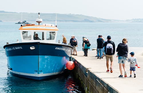 People boarding a St Mary's Boatmen Association tripper boat - Tresco, Isles of Scilly
