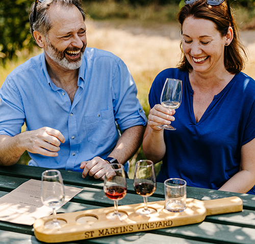 couple wine tasting - St Martin's Vineyard - Isles of Scilly