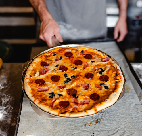 The Island Bakery pizzas being made - St Martin's, Isles of Scilly