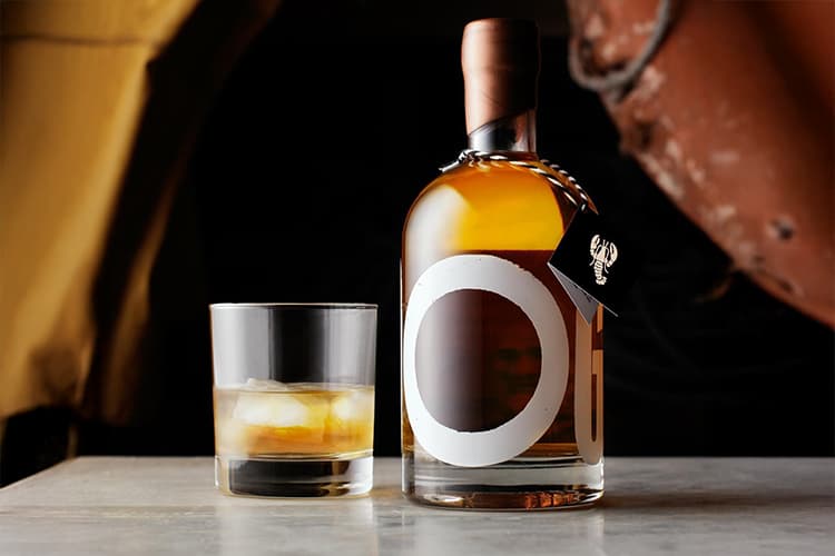 SC Dogs bottle and a glass filled with rum and ice